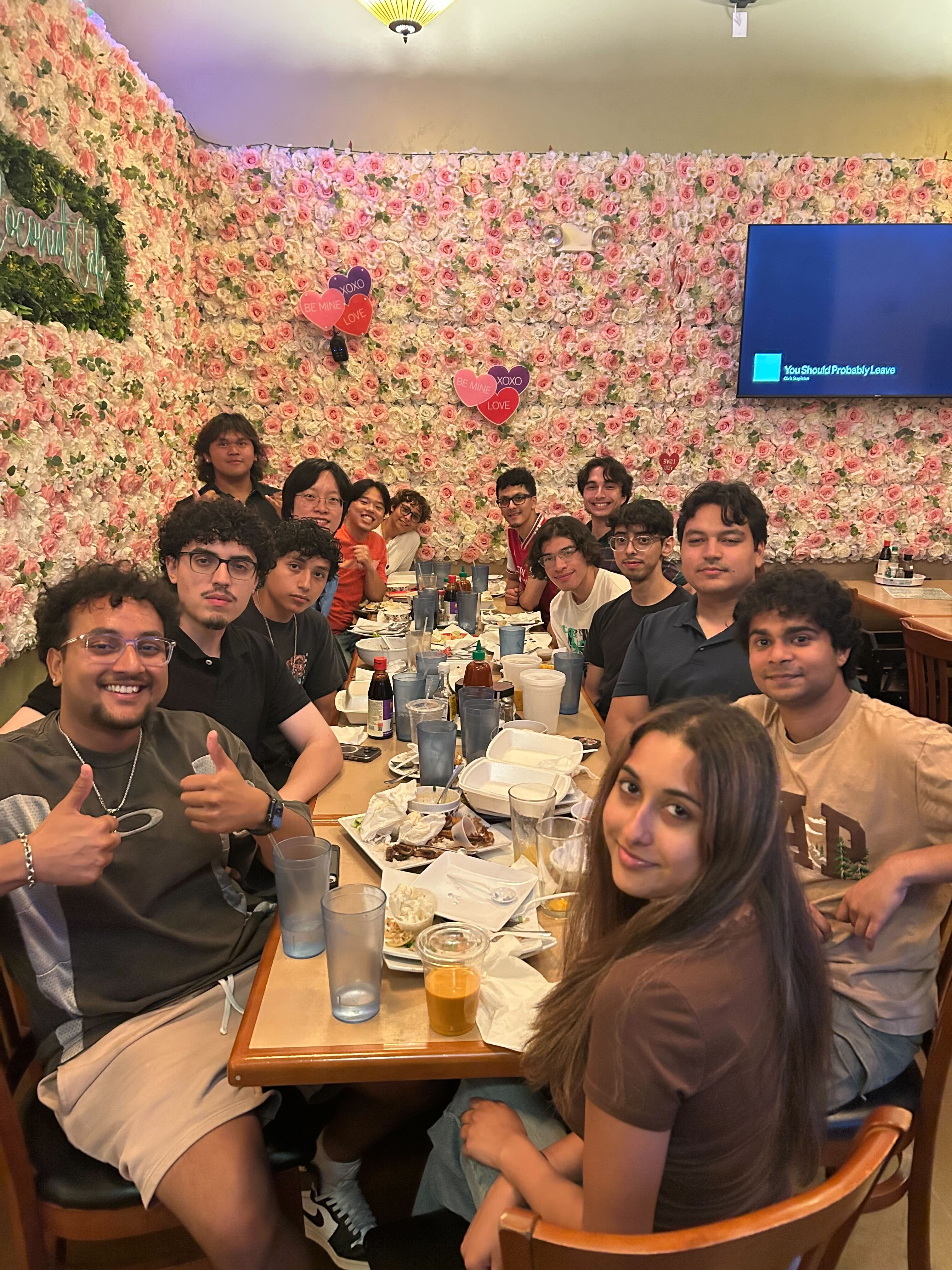 Group photo from the Spring 2026 lab dinner at Coconut Cafe