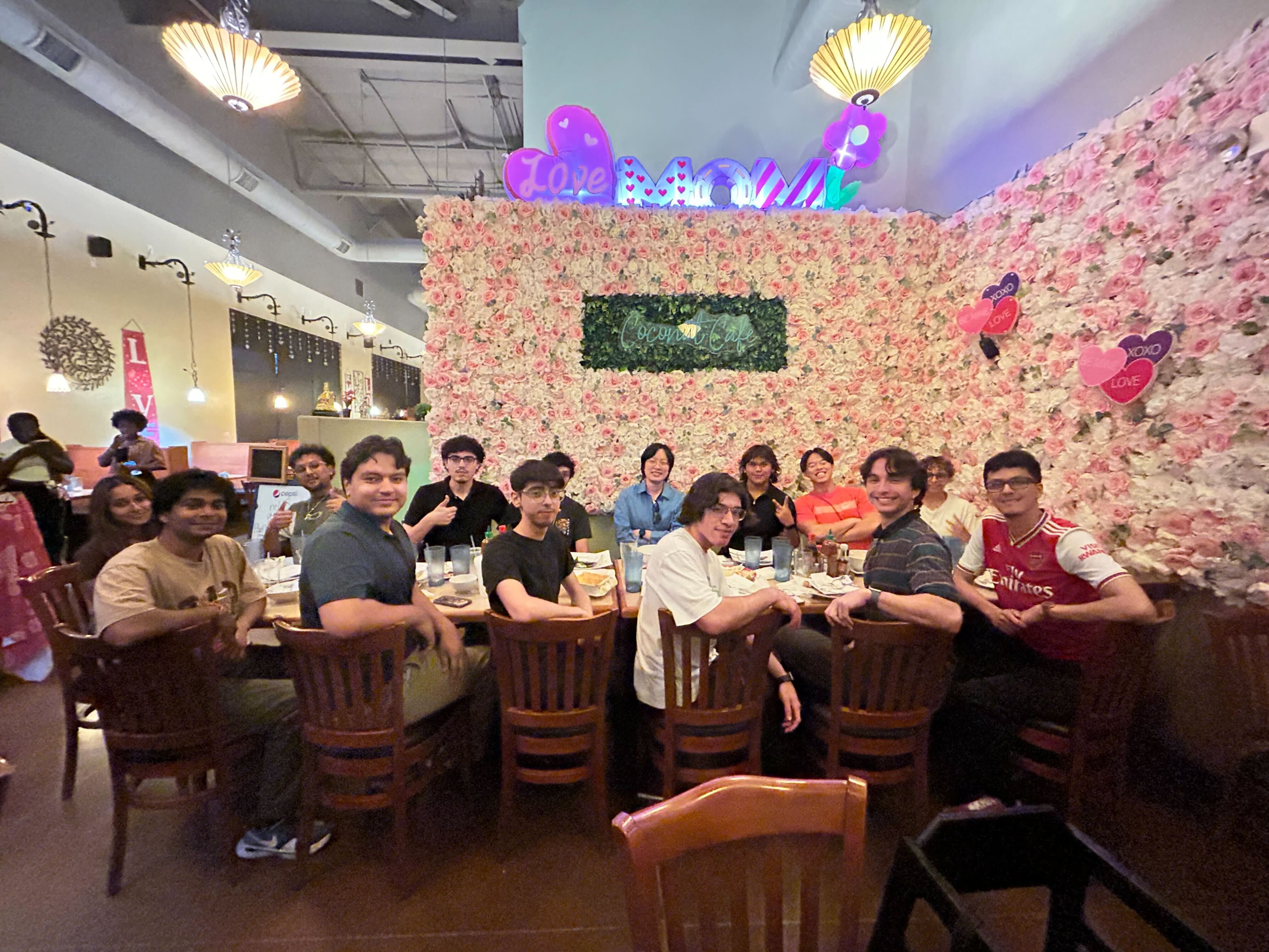 Group photo from the Spring 2026 lab dinner at Coconut Cafe